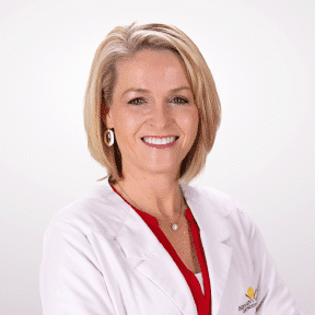 Expert Orthodontist in Escondido, CA Dr. Fortney in her HVO white coat